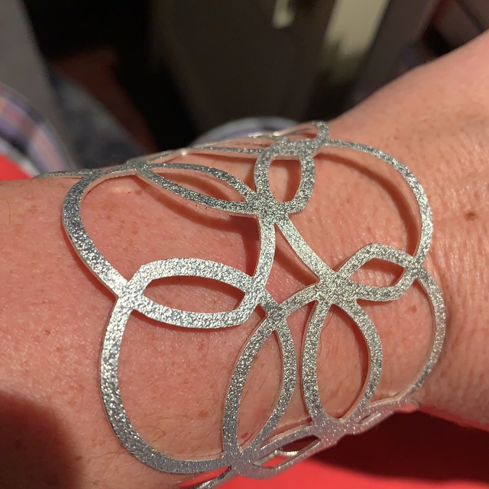 Silver plated bracelet; 3 inches wide; 7 1/2 inches around